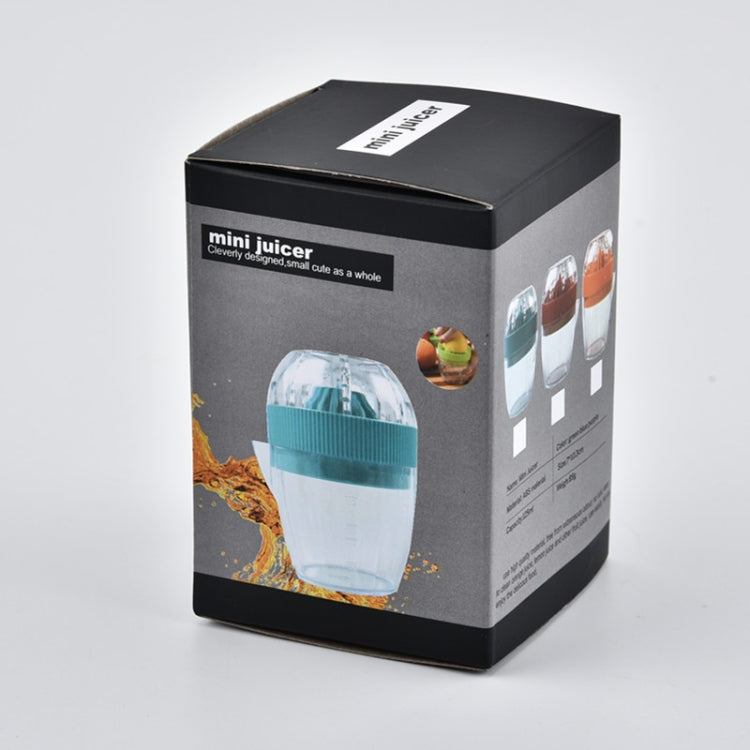 Multi-function Manual Mini Lemon Juicer with a Graduation Cup Juicer (Random Color Delivery)