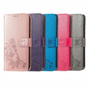 For  Doogee X96 Pro Four-leaf Clasp Embossed Buckle Mobile Phone Protection Leather Case with Lanyard & Card Slot & Wallet & Bracket Function(Purple)
