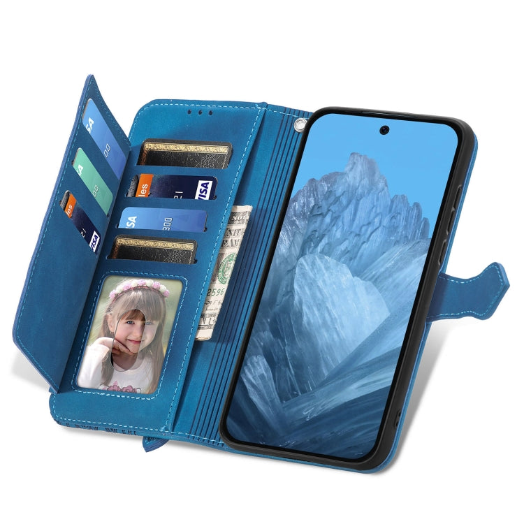 For Google Pixel 9 Pro Embossed Flower Zipper Leather Phone Case(Blue)