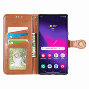 For Samsung Galaxy S25 5G Retro Solid Color Buckle Leather Phone Case(Brown)