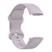 For Fitbit Charge 6 Solid Color Butterfly Buckle Silicone Watch Band, Size:S Size(Light Purple)