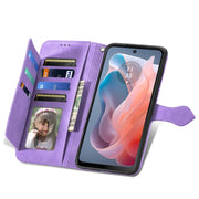 For Motorola Moto G Play 2024 Embossed Flower Zipper Leather Phone Case(Purple)
