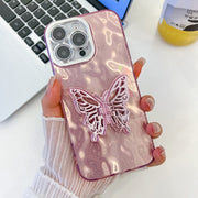 For iPhone 16 Pro Plating Glitter Texture Butterfly Holder TPU Phone Case with Lens Film(Pink Wrinkles)