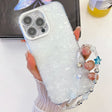 For iPhone 16 Pro Plating Glitter Texture Chain Wristband TPU Phone Case with Lens Film(White Shell Pattern) - iPhone 16 Pro Cases by PMC TechLife | Online Shopping South Africa | PMC TechLife | Buy Now Pay Later Mobicred