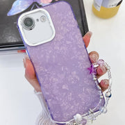 For iPhone 16e Plating Glitter Texture Chain Wristband TPU Phone Case with Lens Film(Purple Shell Pattern)