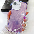 For iPhone 16e Plating Glitter Texture Chain Wristband TPU Phone Case with Lens Film(Purple Feather Yarn) - iPhone 16e Cases by PMC TechLife | Online Shopping South Africa | PMC TechLife | Buy Now Pay Later Mobicred
