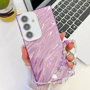 For Samsung Galaxy S25 5G Plating Glitter Texture Chain Wristband TPU Phone Case with Lens Film(Purple Water Ripples)