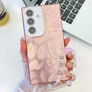 For Samsung Galaxy S25+ 5G Plating Glitter Texture Chain Wristband TPU Phone Case with Lens Film(Pink Feathers)