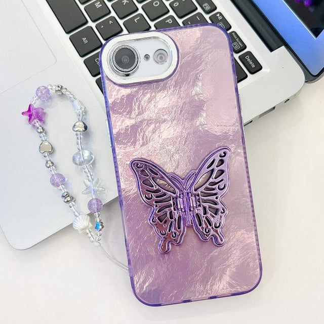 For iPhone 16e Plating Glitter Lens Film Texture Butterfly Holder Wristband Phone Case(Purple Tinfoil Texture)
