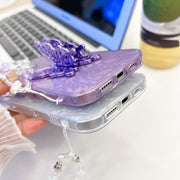 For iPhone 16 Plating Glitter Lens Film Texture Butterfly Holder Wristband Phone Case(Pink Tinfoil Texture)