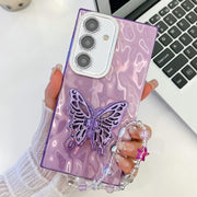For Samsung Galaxy S25 5G Plating Glitter Lens Film Texture Butterfly Holder Wristband Phone Case(Purple Wrinkles)