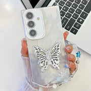 For Samsung Galaxy S25+ 5G Plating Glitter Lens Film Texture Butterfly Holder Wristband Phone Case(White Feather Yarn)