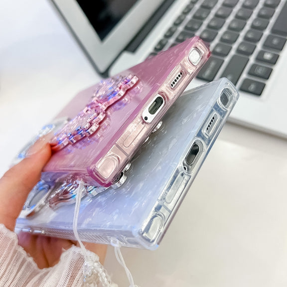For Samsung Galaxy S25 Ultra 5G Plating Glitter Lens Film Texture Butterfly Holder Wristband Phone Case(White Feathers)