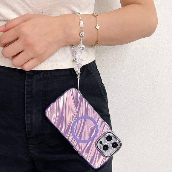 For iPhone 16 Plating Texture Wristband MagSafe TPU Phone Case with Glitter Lens Film(White Water Ripples)