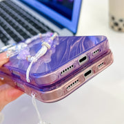 For iPhone 16 Plus Plating Texture Wristband MagSafe TPU Phone Case with Glitter Lens Film(White Shell Pattern)