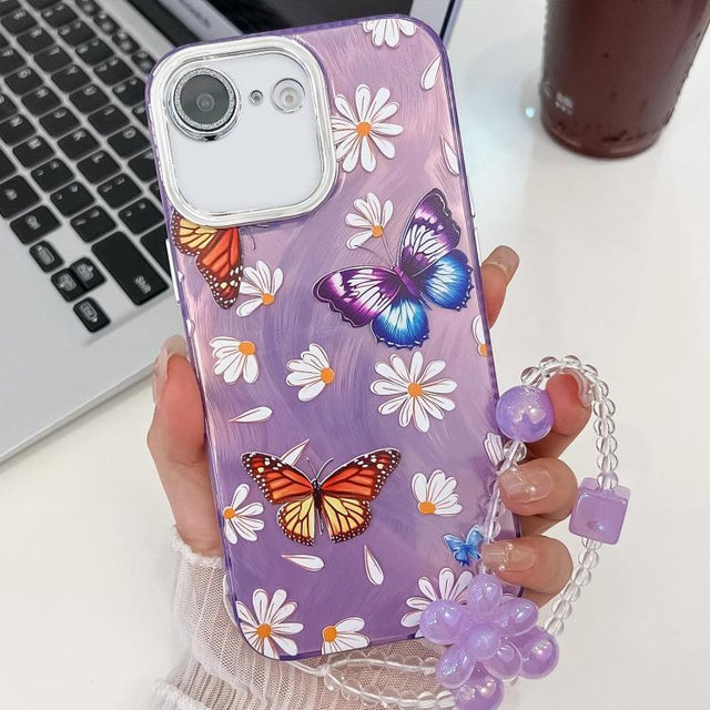 For iPhone 16e Plating Texture Butterfly Wristband TPU Phone Case with Glitter Lens Film(Daisy Butterflies HU2)