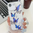 For iPhone 16e Plating Texture Butterfly Wristband TPU Phone Case with Glitter Lens Film(Blue Butterflies HU3) - free shipping - PMC TechLife - Order now!