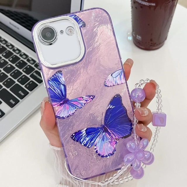 For iPhone 16e Plating Texture Butterfly Wristband TPU Phone Case with Glitter Lens Film(Purple Butterflies HU4)