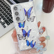 For Samsung Galaxy S25+ 5G Plating Texture Butterfly Wristband TPU Phone Case with Glitter Lens Film(Blue Butterflies HU3) - free shipping - PMC Jewellery - Order now!