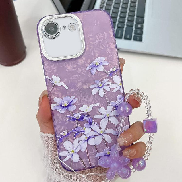 For iPhone 16e Electroplating Flowers Plants Texture Wristband TPU Phone Case(Lilac Flowers FL16)