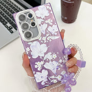 For Samsung Galaxy S25 Ultra 5G Electroplating Flowers Plants Texture Wristband TPU Phone Case(Pale Purple FlowerFL11)