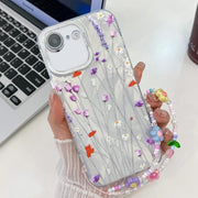 For iPhone 16e Electroplating Flower Texture Wristband TPU Phone Case(Purple Wildflowers SH1)