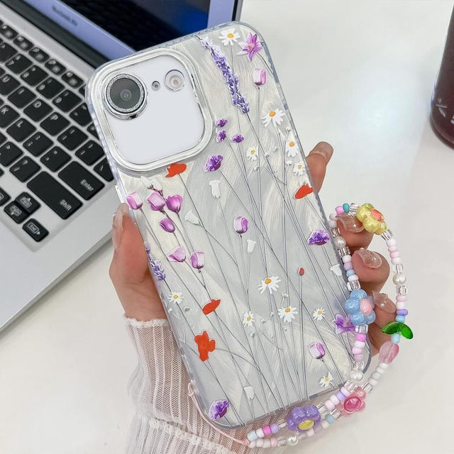 For iPhone 16e Electroplating Flower Texture Wristband TPU Phone Case(Purple Wildflowers SH1)