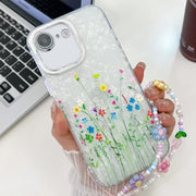 For iPhone 16e Electroplating Flower Texture Wristband TPU Phone Case(Little Wildflower SH3)