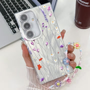 For Samsung Galaxy S25 5G Electroplating Flower Texture Wristband TPU Phone Case(Purple Wildflowers SH1)