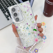 For Samsung Galaxy S25+ 5G Electroplating Flower Texture Wristband TPU Phone Case(Wild Chrysanthemum SH5)