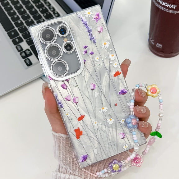 For Samsung Galaxy S25 Ultra 5G Electroplating Flower Texture Wristband TPU Phone Case(Purple Wildflowers SH1)