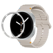 For Samsung Galaxy Watch8 44mm Diamond Bezel and Wavy Grain Stitched Color Buckle Silicone Watch Band(Starlight Silver)