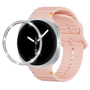 For Samsung Galaxy Watch8 44mm Diamond Bezel and Wavy Grain Stitched Color Buckle Silicone Watch Band(Pink Silver)