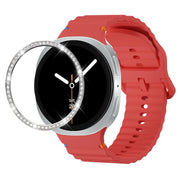 For Samsung Galaxy Watch8 44mm Diamond Bezel and Wavy Grain Stitched Color Buckle Silicone Watch Band(Red Silver)