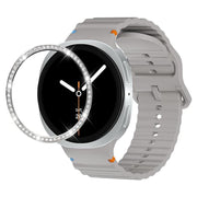 For Samsung Galaxy Watch8 44mm Diamond Bezel and Wavy Grain Stitched Color Buckle Silicone Watch Band(Gray Silver)