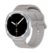 For Samsung Galaxy Watch8 44mm Diamond Bezel and Wavy Grain Stitched Color Buckle Silicone Watch Band(Gray Silver)