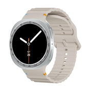 For Samsung Galaxy Watch8 44mm Speed Bezel and Wavy Grain Stitched Color Buckle Silicone Watch Band(Starlight Silver)