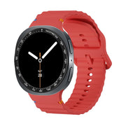 For Samsung Galaxy Watch8 44mm Speed Bezel and Wavy Grain Stitched Color Buckle Silicone Watch Band(Red Black)