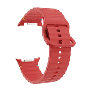 For Samsung Galaxy Watch8 40mm Speed Bezel and Wavy Grain Stitched Color Buckle Silicone Watch Band(Red Silver)
