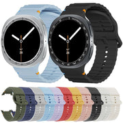 For Samsung Galaxy Watch8 44mm Speed Bezel and Wavy Grain Stitched Color Buckle Silicone Watch Band(Red Silver)