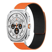 For Samsung Galaxy Watch Ultra 47mm / Ultra 2025 Lychee Texture Soft Magnetic Silicone Watch Band(Orange Black)