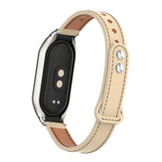 For Xiaomi Mi Band 8 Integrated Metal Case + Double Nail Microfiber Leather Watch Band(Milk Tea Color)