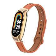 For Xiaomi Mi Band 8 Integrated Metal Case + Double Nail Microfiber Leather Watch Band(Orange)