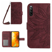 For Sony Xperia 10 V HT04 Skin Feel Sun Flower Embossed Flip Leather Phone Case with Lanyard(Wine Red)