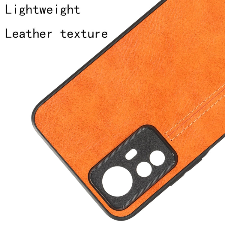 For Xiaomi Redmi Note 12S 4G Sewing Cow Pattern Skin PC + PU + TPU Phone Case(Orange) - free shipping - PMC TechLife - Order now!