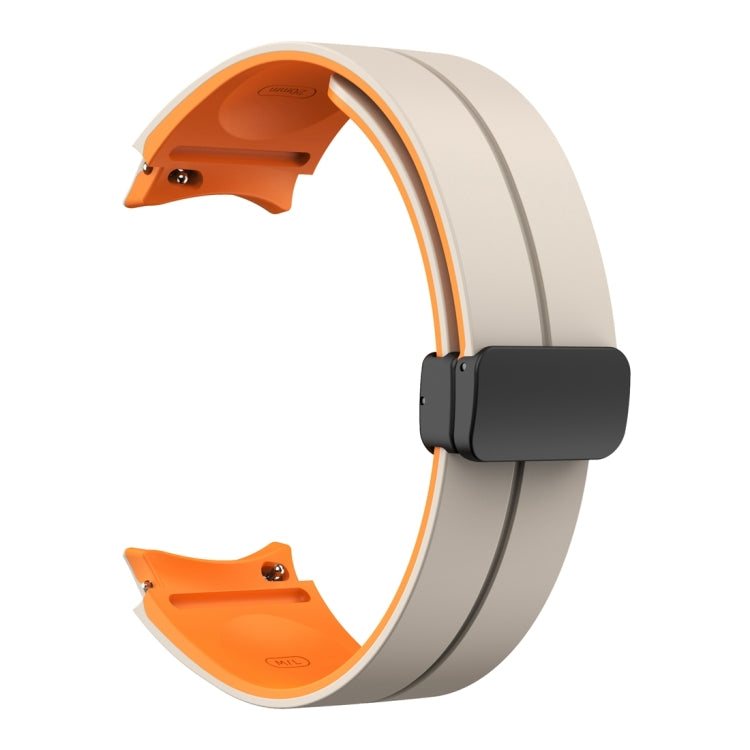 For Samsung Galaxy Watch 6 / 6 Classic Dual Color Magnetic Folding Buckle Silicone Watch Band(Starlight+Orange)