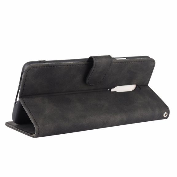 For OnePlus 7 Pro Solid Color Skin Feel Magnetic Buckle Horizontal Flip Calf Texture PU Leather Case with Holder & Card Slots & Wallet(Black)
