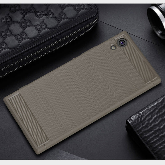 For Sony Xperia XA1 Brushed Texture Carbon Fiber Shockproof TPU Rugged Armor Protective Case(Grey)