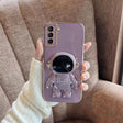 For Samsung Galaxy A13 4G Plating Astronaut Holder Phone Case(Purple) - free shipping - PMC TechLife - Order now!