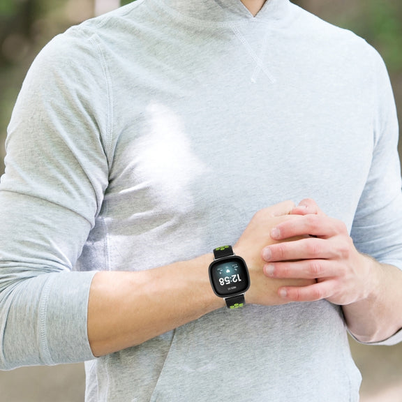 For Fitbit Versa 4 Two-Color Perforated Breathable Silicone Watch Band(Black+Rose Red)